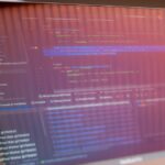 A developer working on a custom financial software interface, showcasing creativity and innovation in fintech solutions.