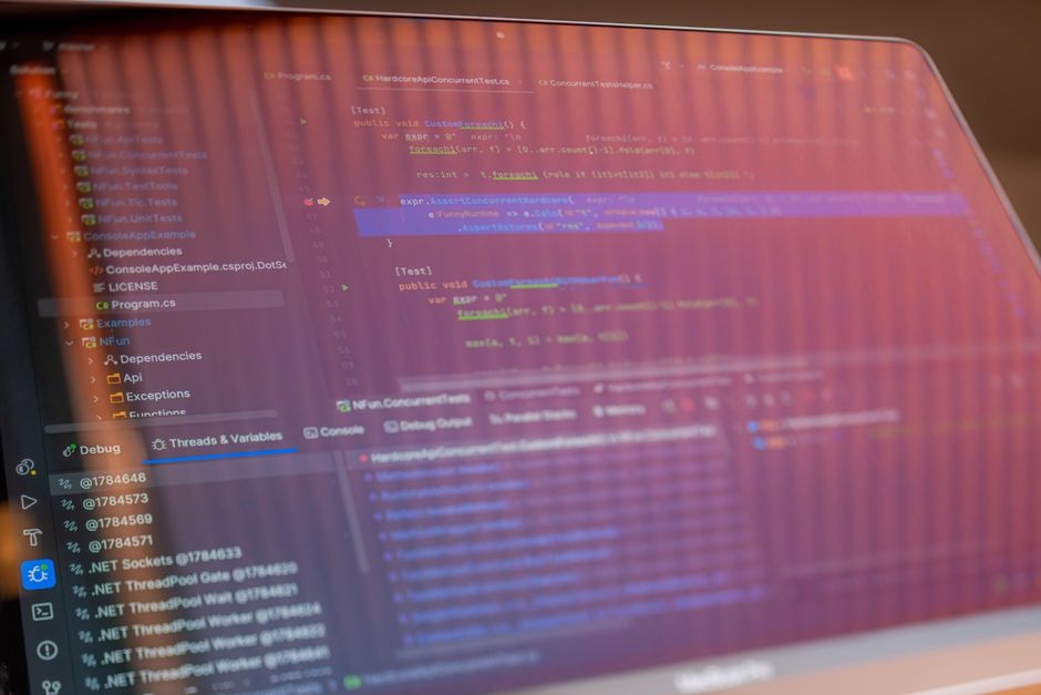 A developer working on a custom financial software interface, showcasing creativity and innovation in fintech solutions.
